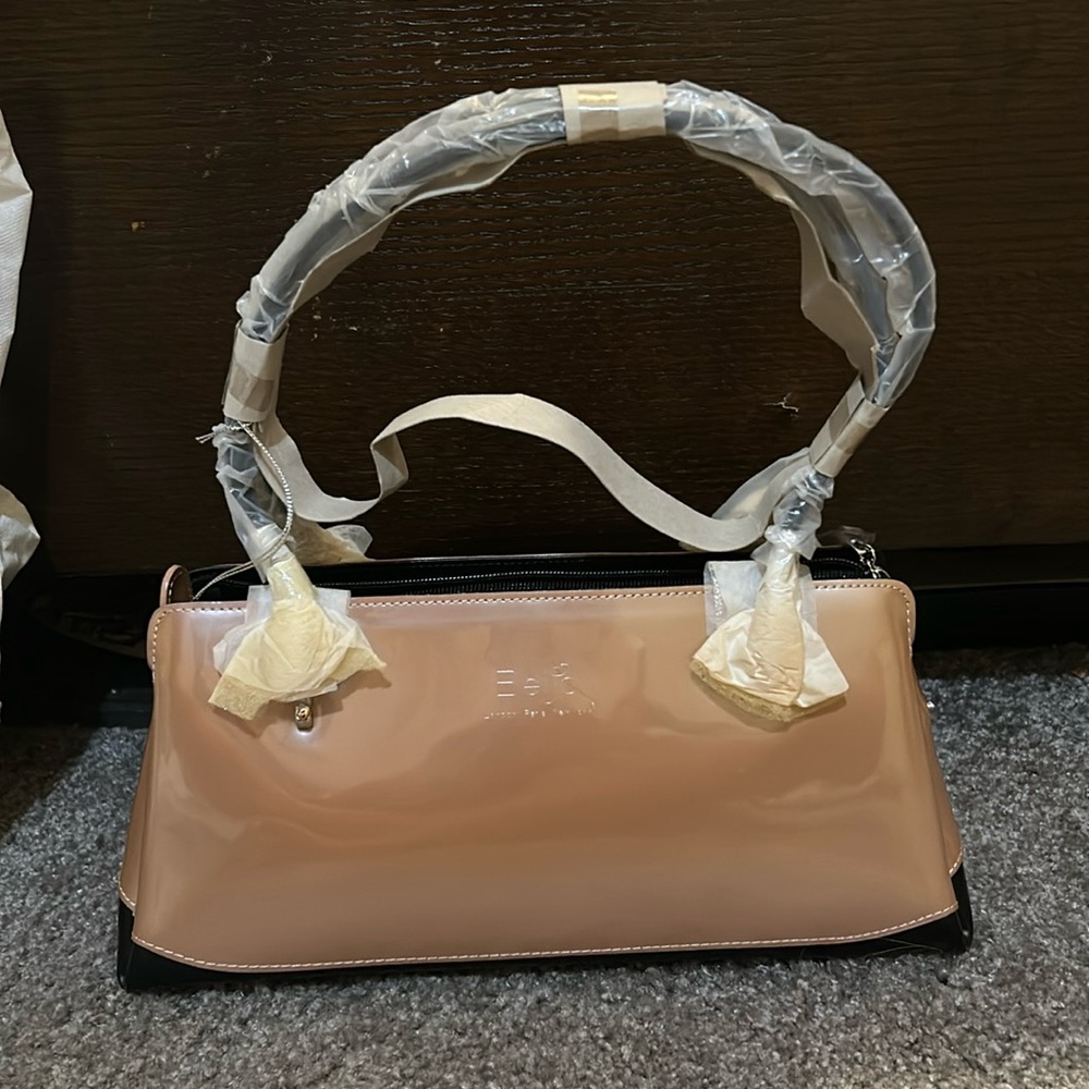 Beijo Handbag London Paris New York new with tags and dust bag baby pink